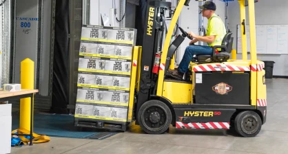 Used Hyster pneumatic tire forklift working an outdoor yard in Delaware