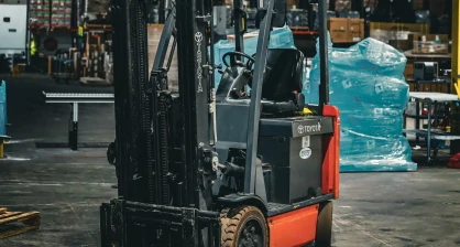 Used Toyota electric counterbalanced forklift in a Delaware warehouse